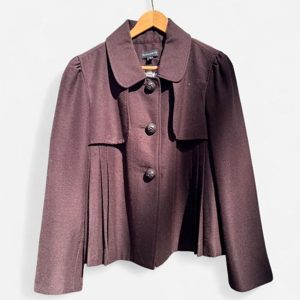 Brown wool blend cape coat with pleated front and button closure. Size M